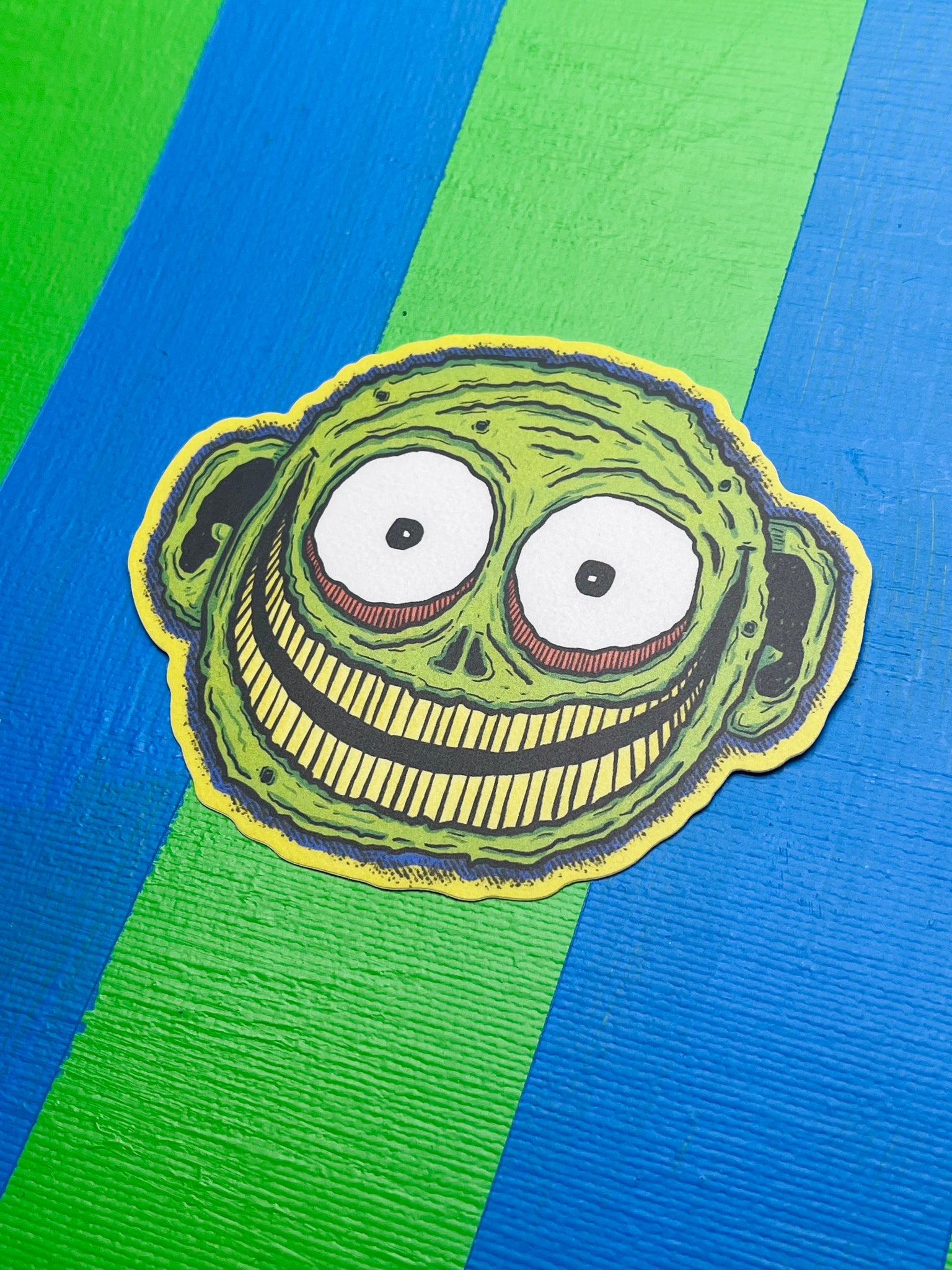 Creepy Green Faced Kid Vinyl Sticker