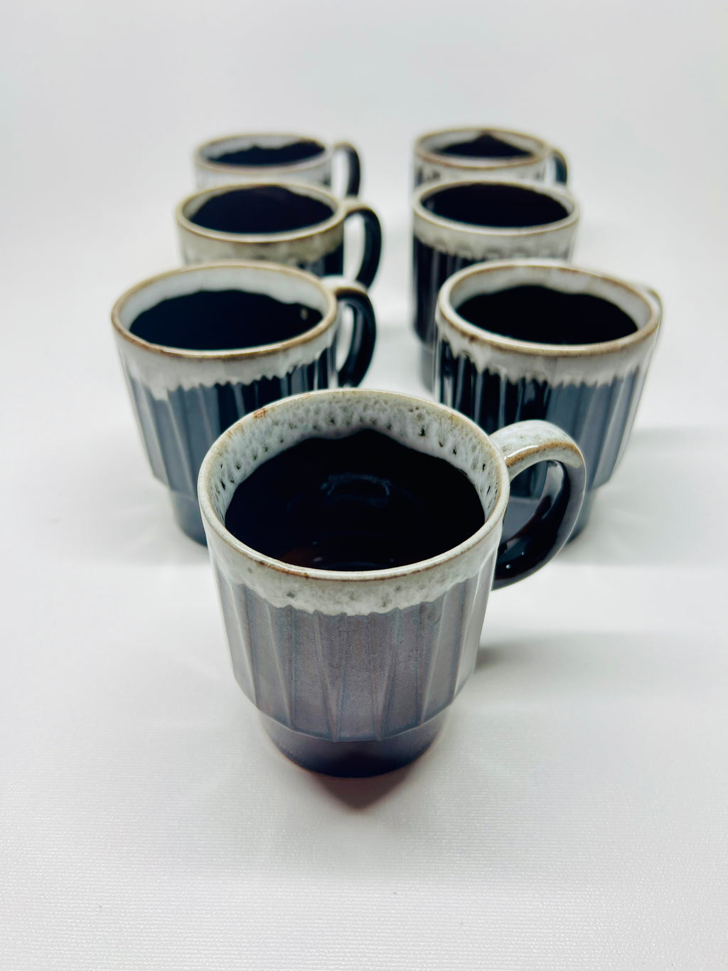Set of 7 Glazed Mugs