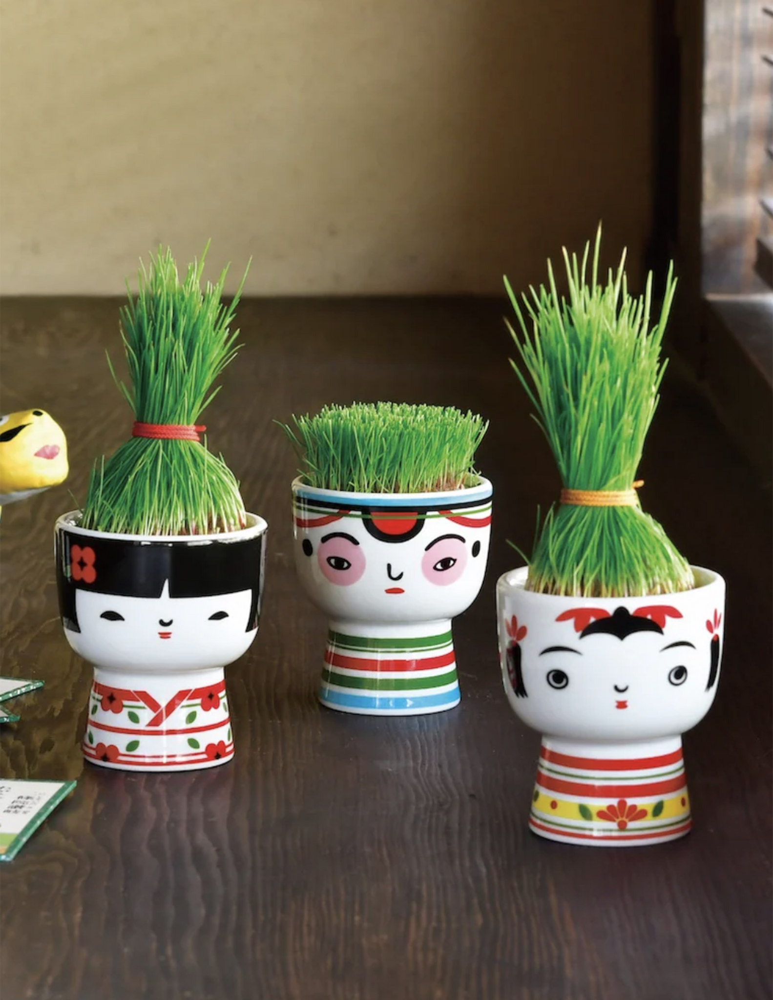 Kokeshi Green – Pinecone+Chickadee